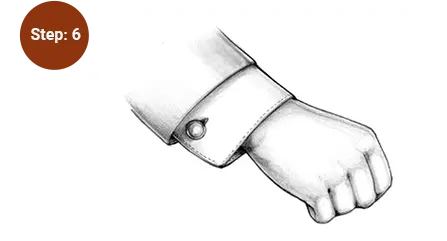 The cufflinks are put on successfully.